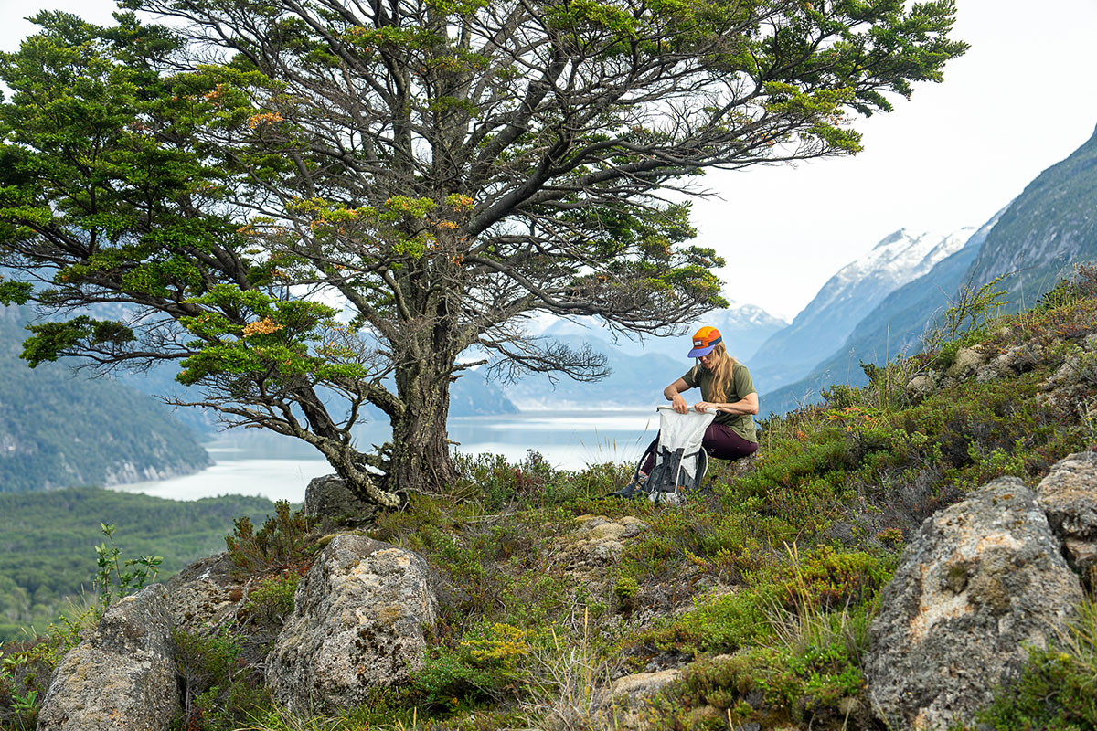 Day hiking checklist (reaching into daypack)